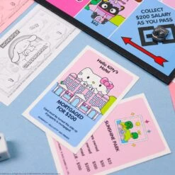 Monopoly: Hello Kitty & Friends 12 Monopoly: Hello Kitty & Friends -Spiderman Hanging Store Hello Kitty Monopoly Cards 41893.1707368263